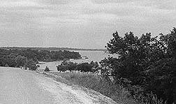 Buckner With Boat Houses In Background 1936